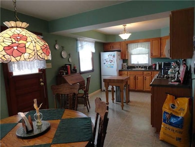 Kitchen. Light over table does not stay, it will b