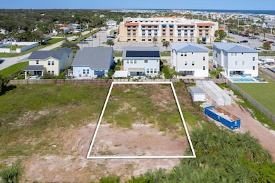 Aerial view of residential area with property parcel outlined