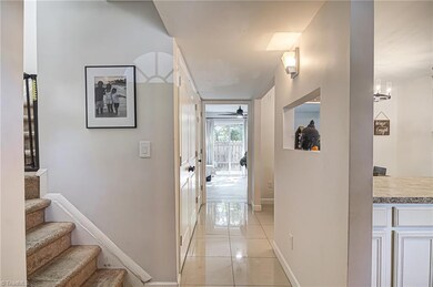 Stairway to the left leads to second floor where bedrooms are located.