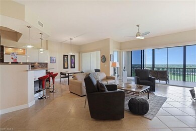 GREAT ROOM SHOWING THE BAR STOOLS BY THE KITCHEN C