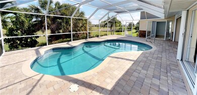 Pool area looking at french doors to master bedroo