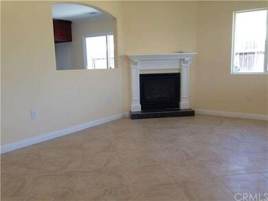 Looking from front entry toward living room with f