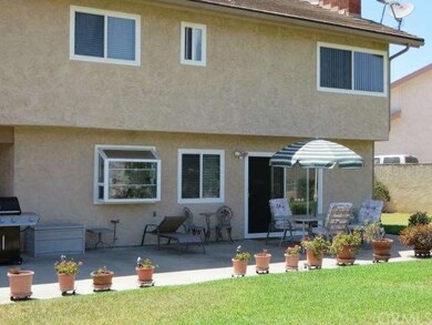 Enjoy the patio in the afternoon, shaded by the ho