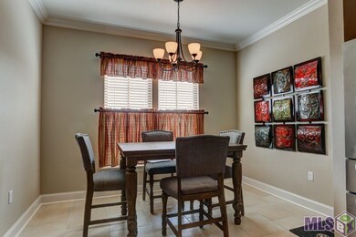 Nice size breakfast area with windows overlooking 