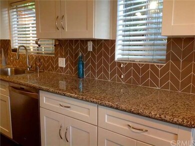 Gorgeous newer kitchen with lots of natural light 