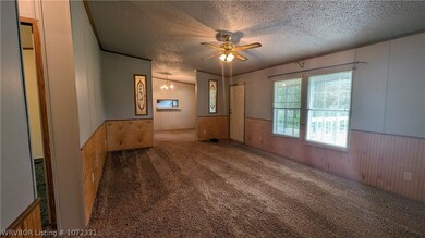 Living room with a pretty view out the front.