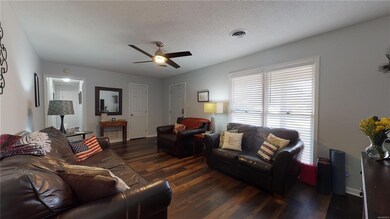 Another view of Den with New Ceiling Fan and New P