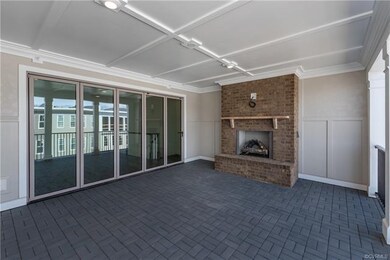 4th Floor Covered Terrace - with brick gas log fir