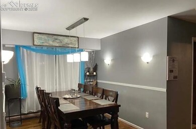 Dining room with wood finished floors