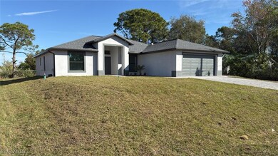 View of front of property featuring roof with shin