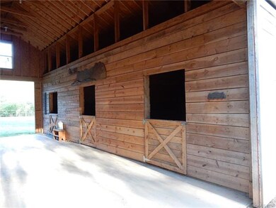 Newer barn is super sturdy and has 4 stalls, tack 