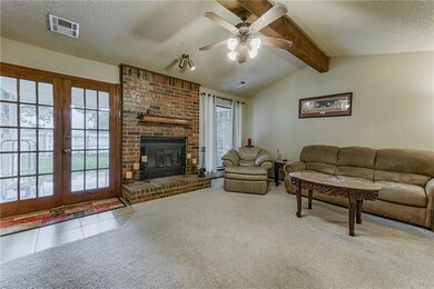 Spacious Living Room with French Doors to the Back