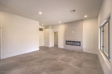 Unfurnished living room with recessed lighting, a