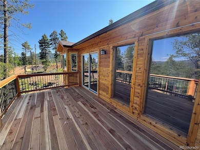 Spacious deck with views of Mt. Blue Sky