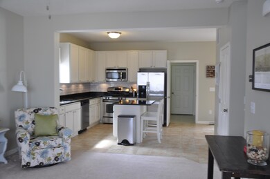 LIVING AREA & SPACIOUS KITCHEN
