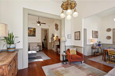 Welcome to a formal double parlor in this historic
