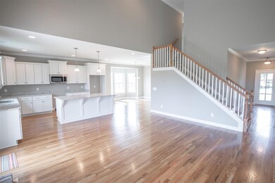 Spacious open living with eat in kitchen off of kitchen. Same floor plan in different color palette.
