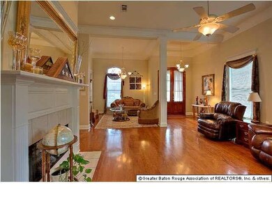 The formal dining also has 12' ceilings, triple cr