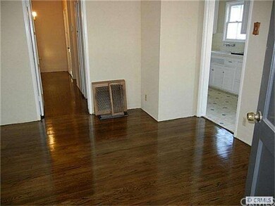 The Freshly-Refinished Wood Floors are Beautiful.