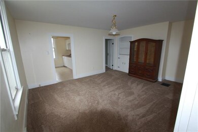 Formal Dining Room - New neutral paint, new lighti