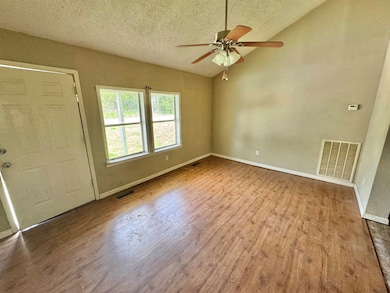 Unfurnished room with wood finished floors, ceilin