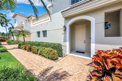 Property entrance featuring stucco siding