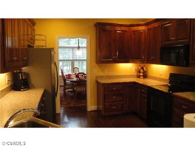Kitchen - custom cabinets ,hardwood floors