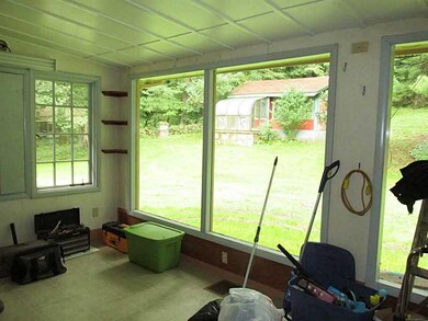 Sunroom. Listed as a den on the  MLS. It could be 