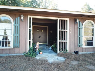 Entry and coy pond