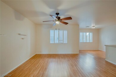 Living room with ceiling fan.