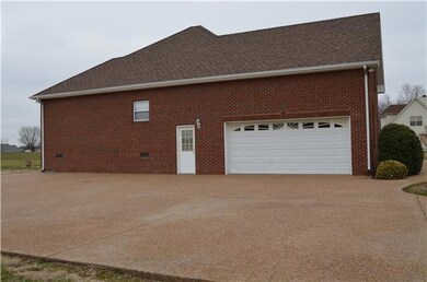 Large Pea Gravel Parking Area.