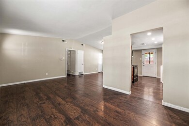 Spare room with hardwood / wood-style floors and l