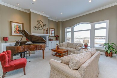Living Room looks out to Fountain Lake