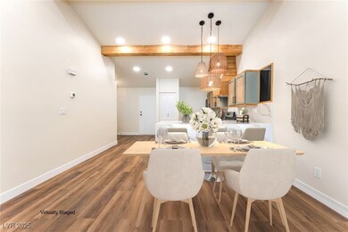 Dining space featuring wood finished floors and re