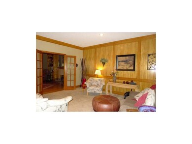 French doors connect living room to great room
