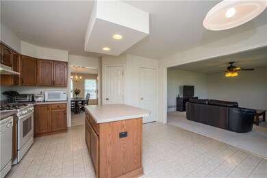 Open concept kitchen w/ center island