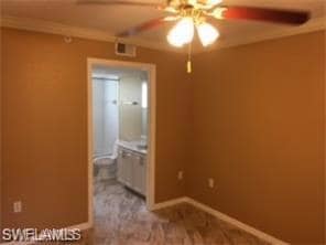 Unfurnished bedroom featuring baseboards, visible 