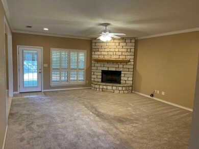 Living Room with Stone Fireplace