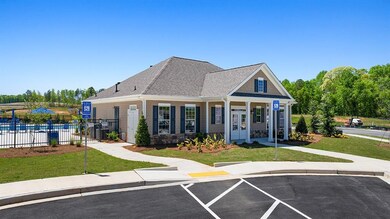 View of front of home with a shingled roof