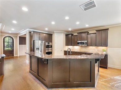 Kitchen featuring light hardwood / wood-style floo