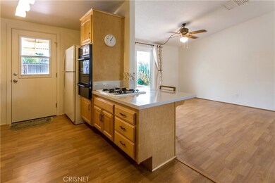 Recently remodeled kitchen. Resurfaced cabinets. Laminate floors through out main areas.