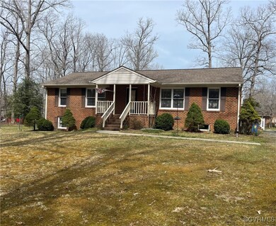 View of front of house featuring a front yard and