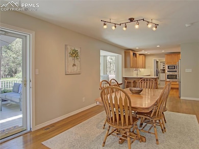 Spacious dining room walks out to the maintenance free composite deck for more space to entertain.