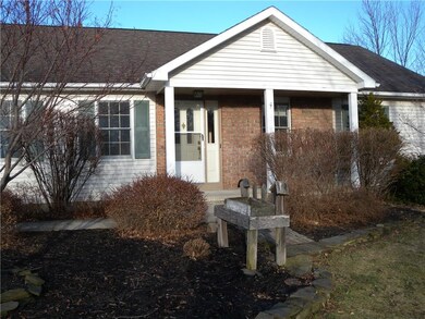 The splash of brick sets off the front entry to yo