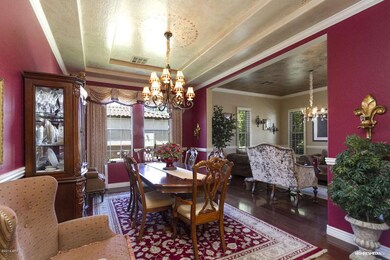 Formal Dinning with wood flooring