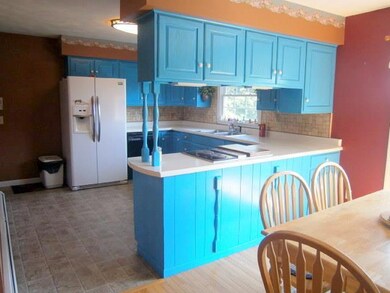 Kitchen opens to the dining area
