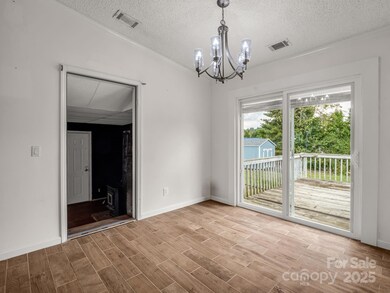 Living Room Looking Toward the Dining Room & Deck