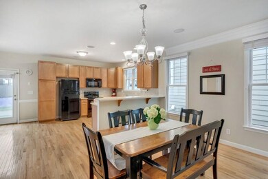 features breakfast bar & Corian counters