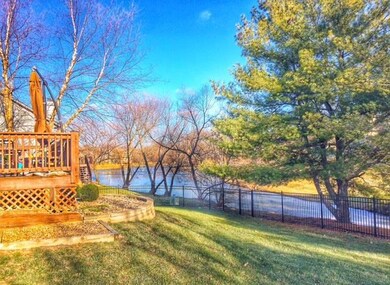 Private backyard backs to stocked pond, entertain 
