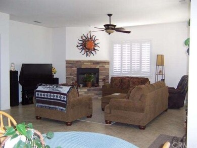 Huge family room with corner fireplace and large t